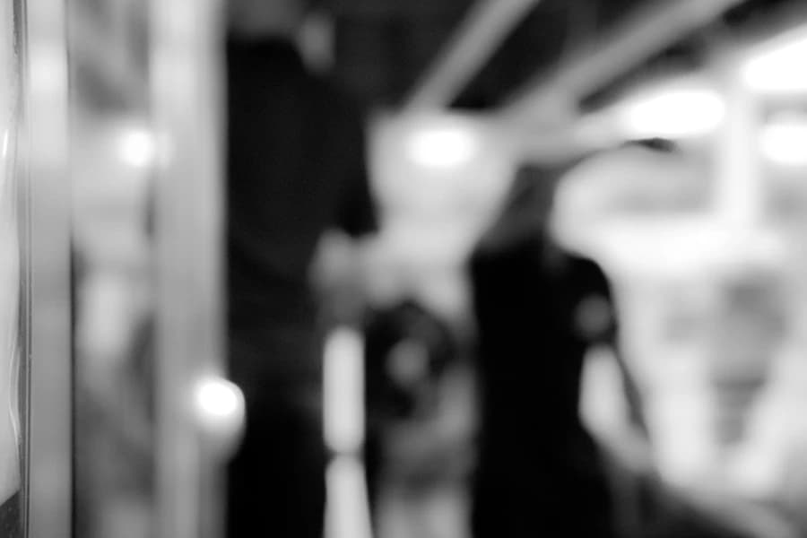 Bright cleaning team working discreetly in a secure facility environment.