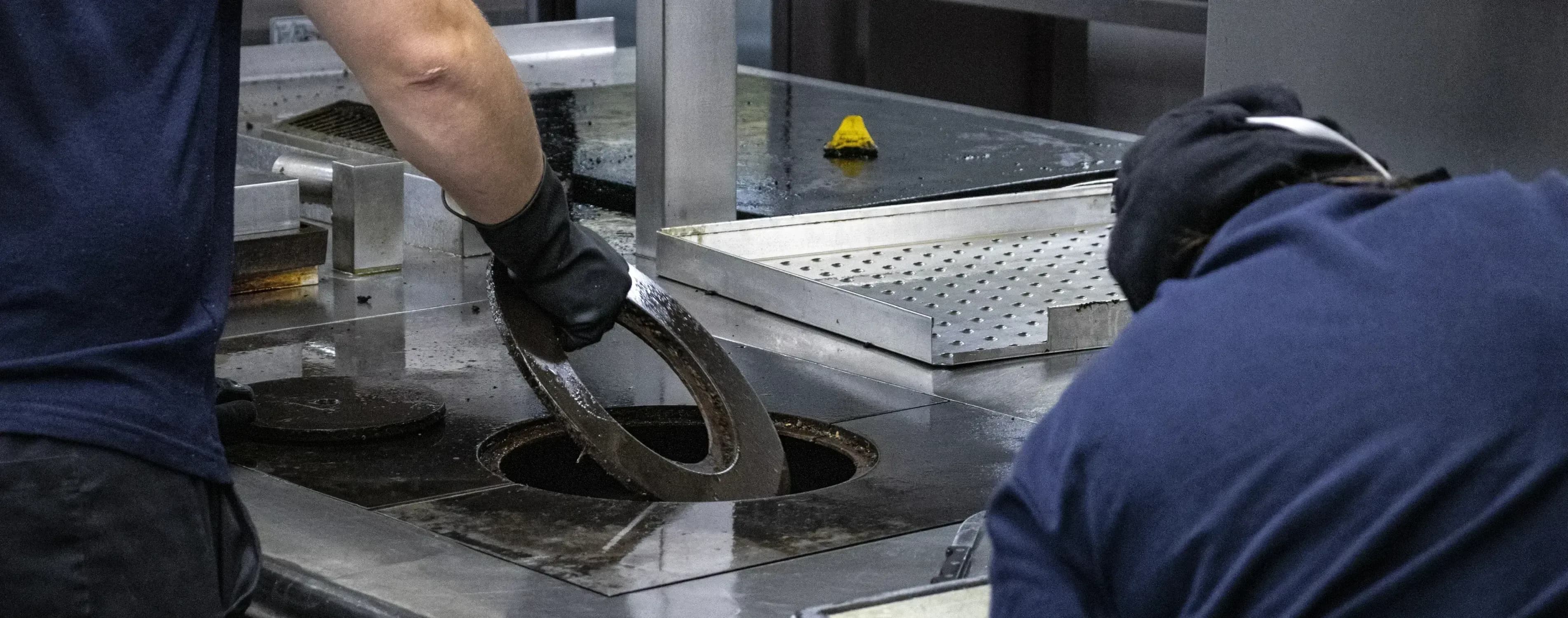 Bright team deep cleaning specialist commercial kitchen equipment.