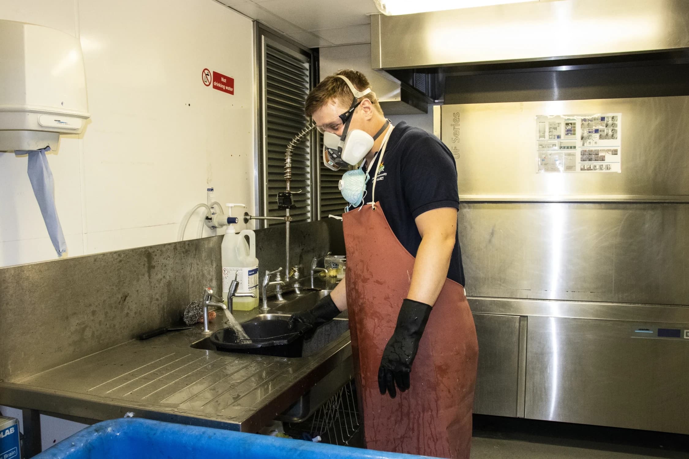Bright team carrying out deep cleaning to professional commercial kitchen standards.