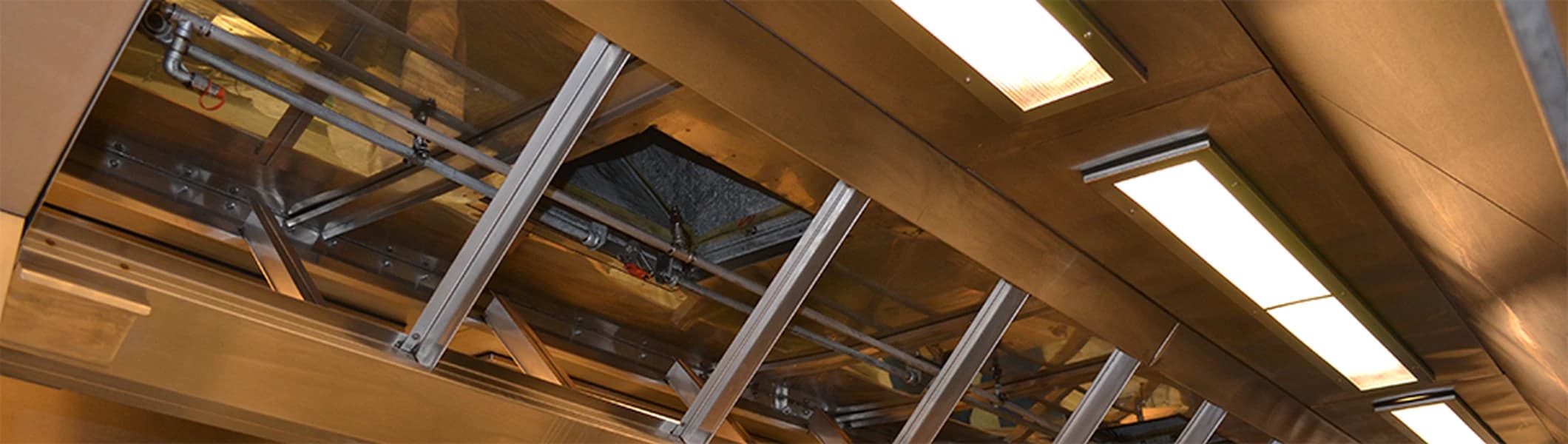 Deep cleaning of grease extraction and ventilation system in commercial kitchen.