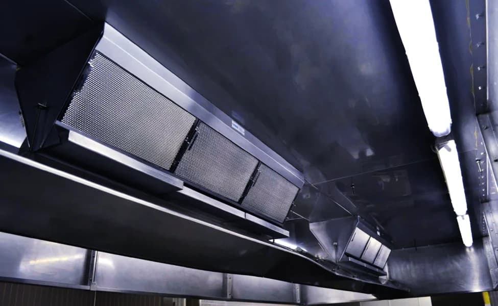 Professional grease extract cleaning of commercial kitchen ductwork and canopy system.